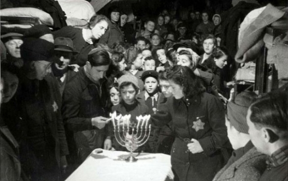 Chanukah, 1943, Westerbork, Holland. By a Jewish inmate, Rudolf Werner Breslauer, probably in early 1943. These people were later deported to death camps in Poland. From the Yad Vashem Photo Archive